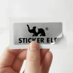 Silver kiss cut sticker with the StickerEle logo on its backing